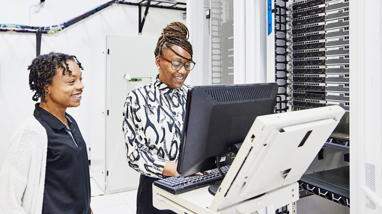 female it workers in server room